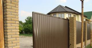 Купить откатные ворота из профнастила Тихорецк, цена от 1735 руб.
